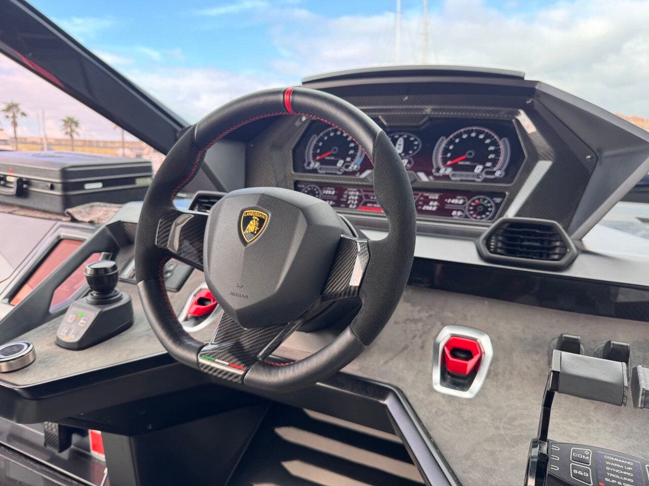 The carbon fibre helm and Lamborghini steering wheel of the Tecnomar 63