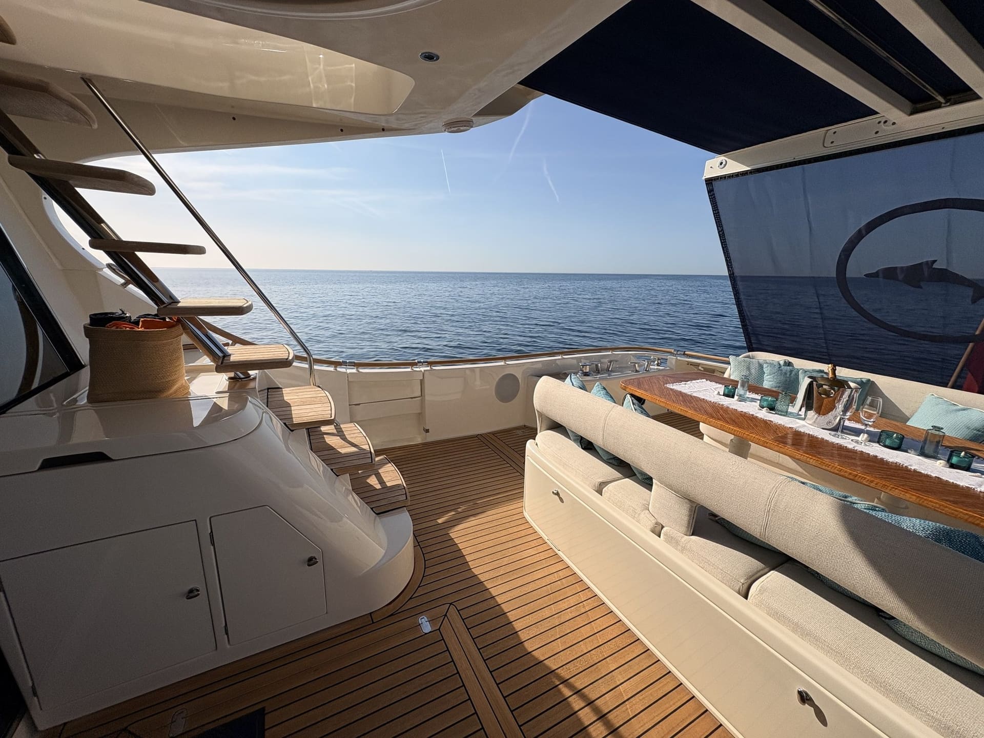 Mochi Craft Dolphin 74 Contango, flybridge at golden hour