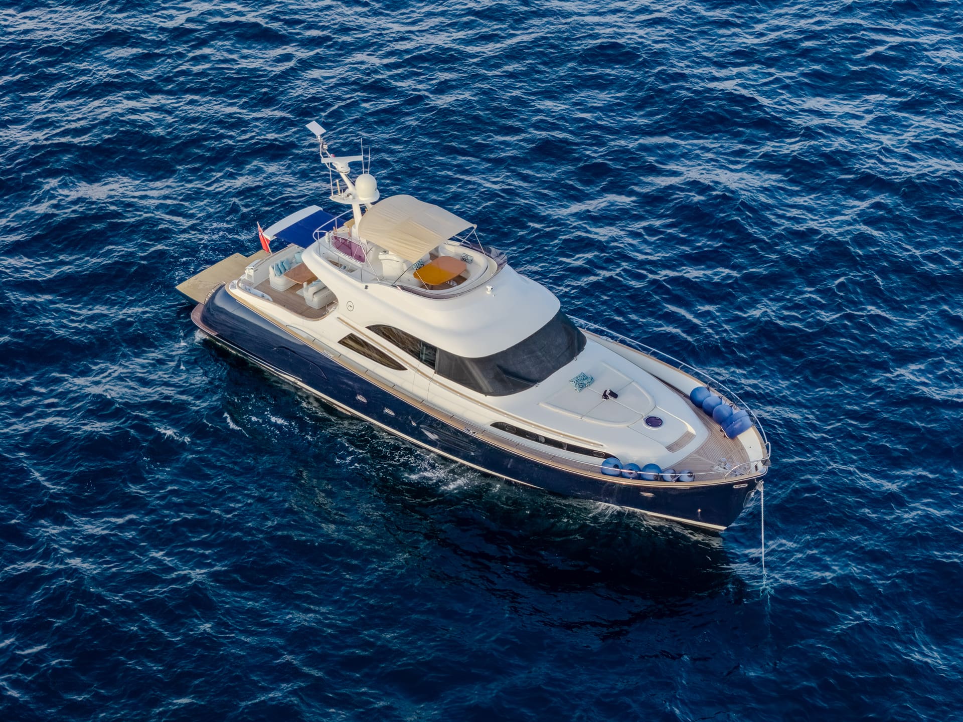 Mochi Craft Dolphin 74 Contango, aerial view from off the starboard bow