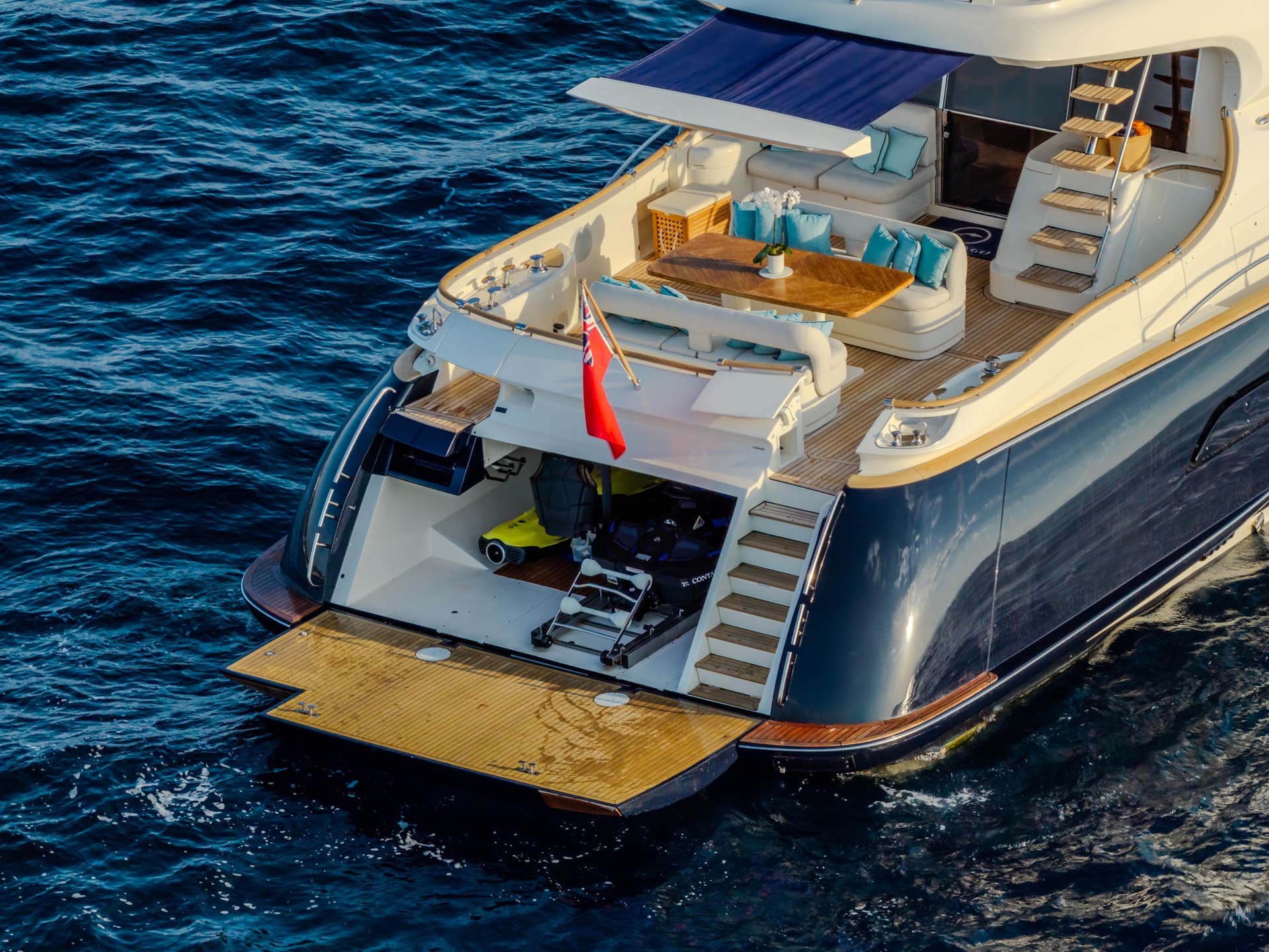 Mochi Craft Dolphin 74 Contango, aerial view of the stern with the transom garage open