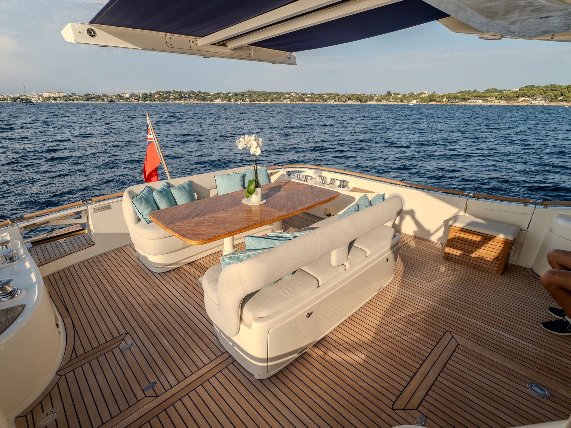 Mochi Craft Dolphin 74 Contango, aft deck dining under the awning