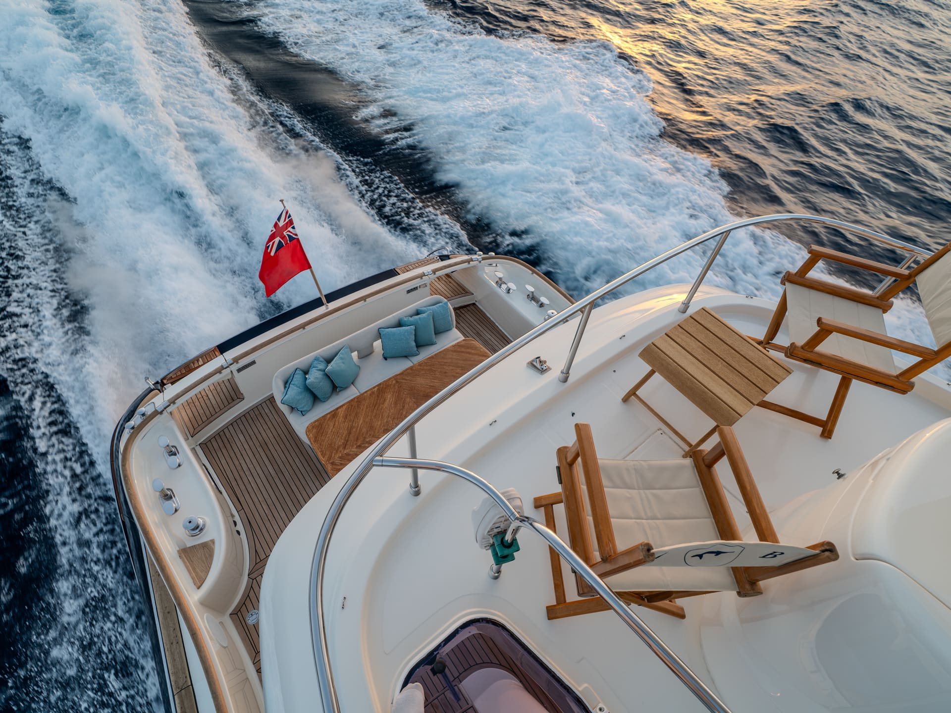 Mochi Craft Dolphin 74 Contango, aft deck with directors chairs under way